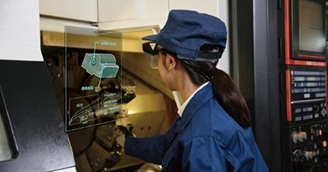 Photo: a worker wearing AR Smart Glasses